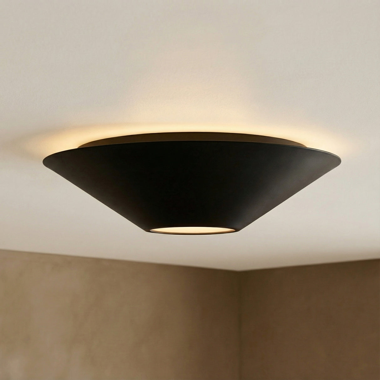Belvin LED Flush Mount 12", Matte Black geometric Flush Mount in a Modern Living Room with warm taupe walls.