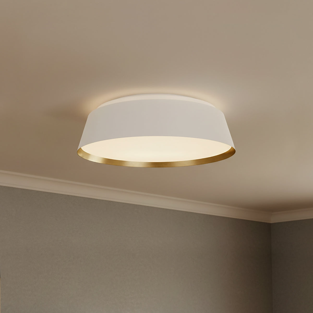 Langston Flush Mount 19" ceiling light, in Matte White with Brushed Brass interior.