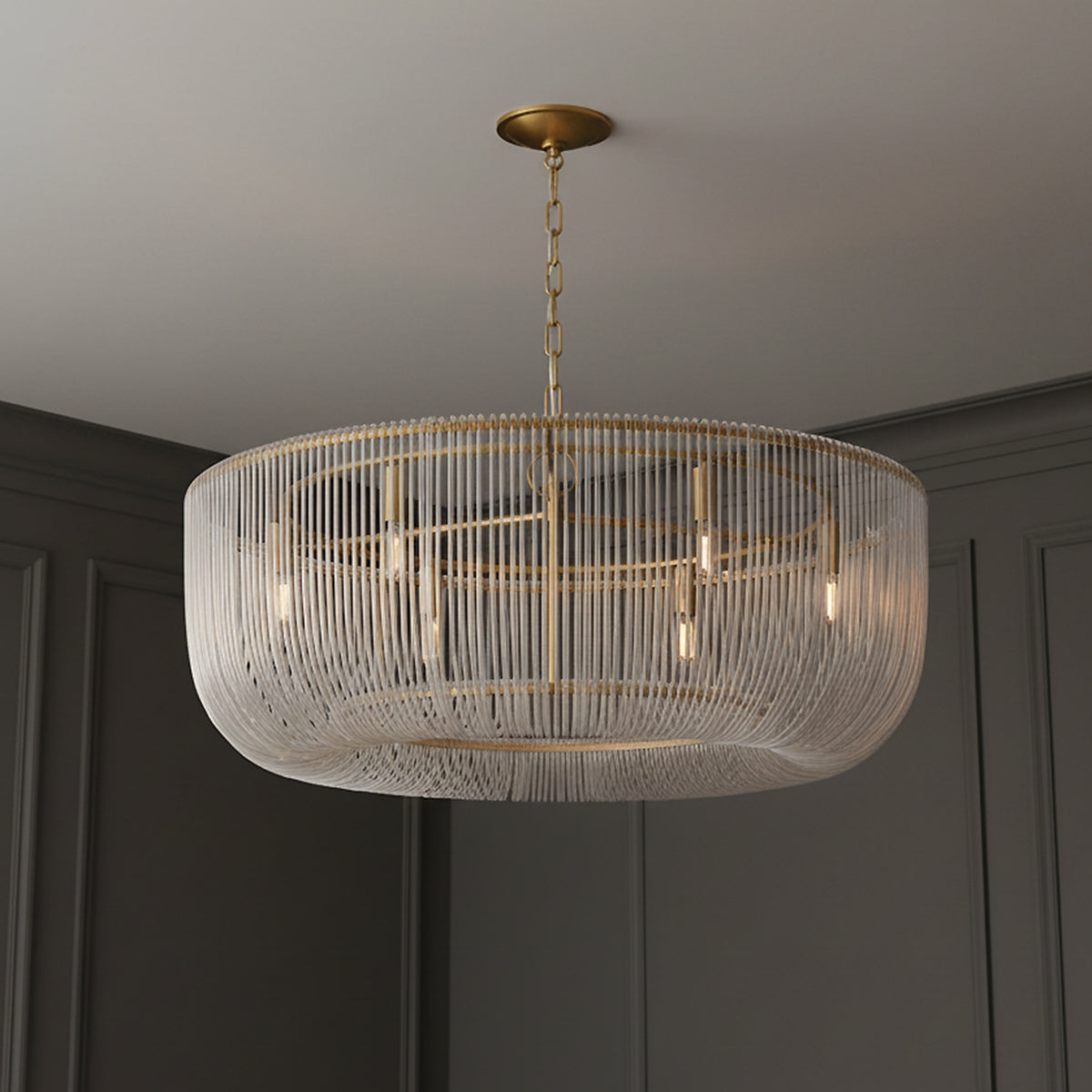 Amir Large Chandelier 36", Modern Brass for Modern home with Dark Gray Wood Paneling