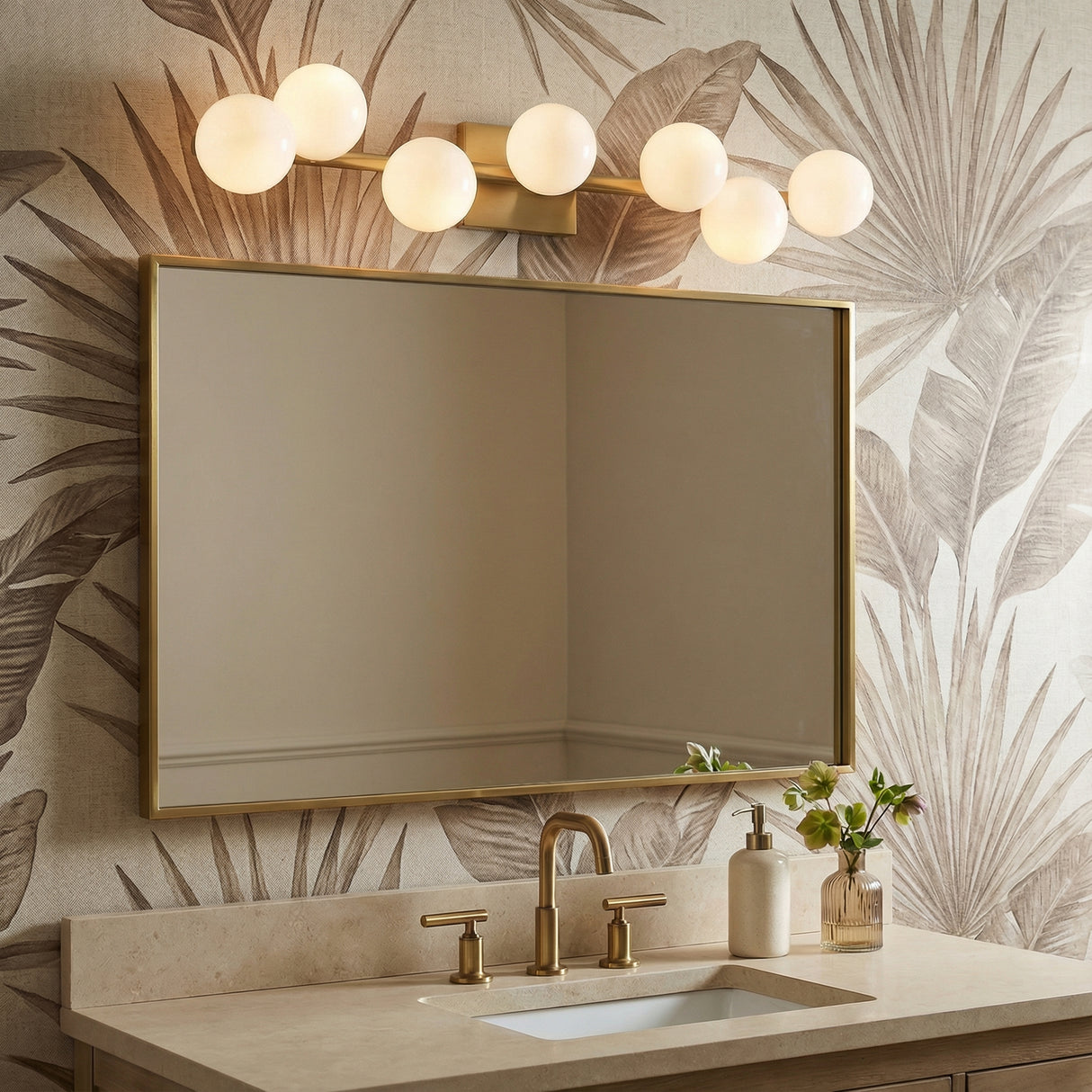 Veya 7 Light Wall Sconce 32" in a modern bathroom with botanical wallpaper and stone vanity.