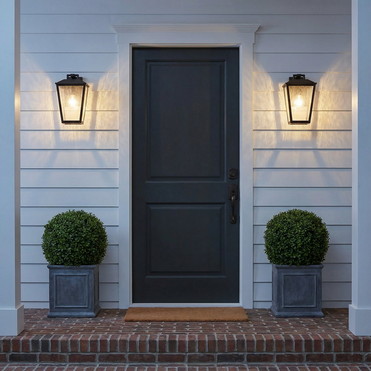 Harrison Outdoor Small Wall Light 10", Matte Black geometric Outdoor Wall in a Modern Farmhouse Outdoor with a black door and boxwood.