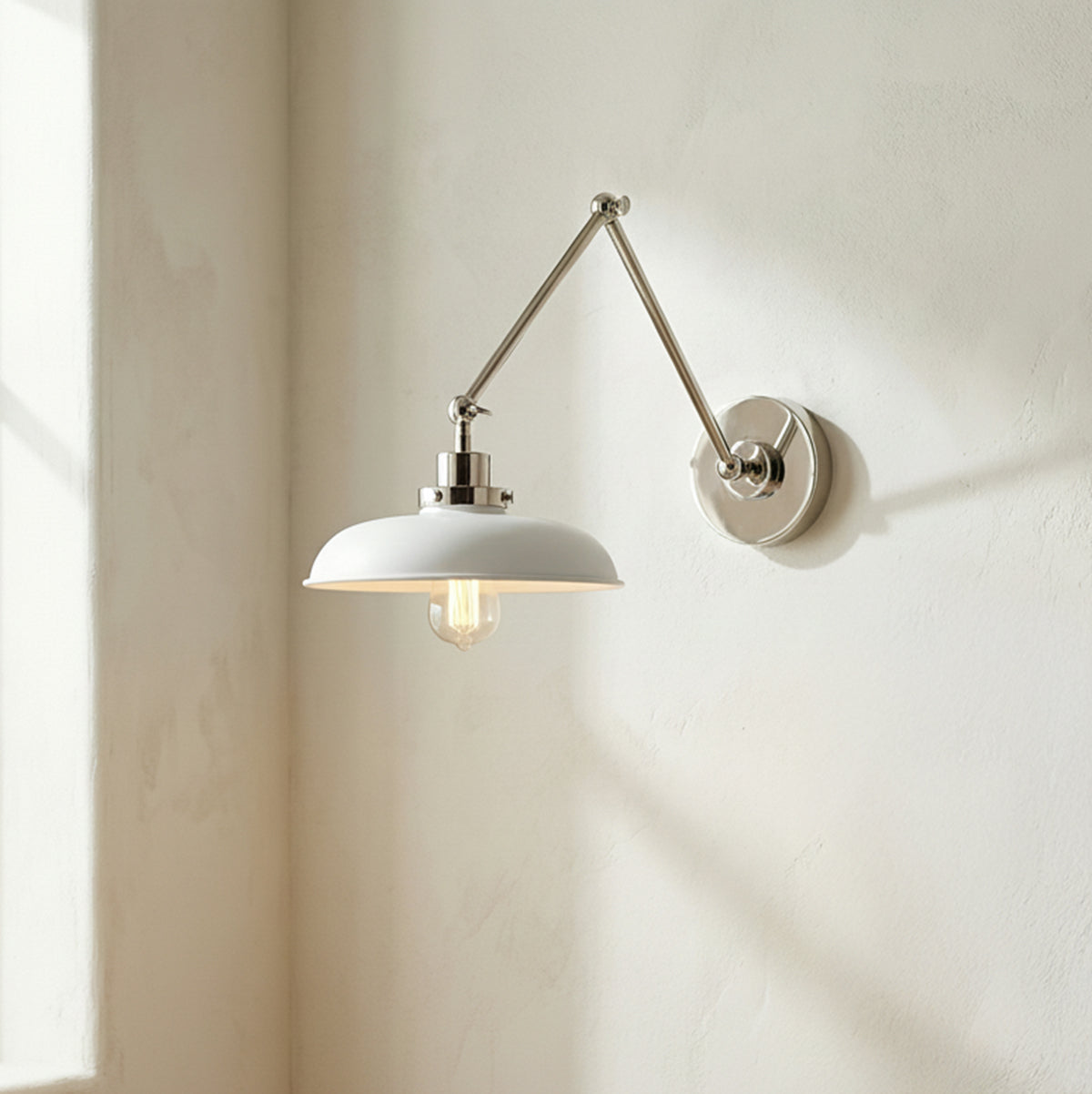 Franklin Adjustable Two Arm Wall Sconce, Matte White and Polished Nickel for Modern Farmhouse home with White Textured Walls