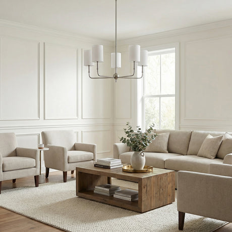 Remington 5 Light Chandelier 26", Brushed Nickel for Transitional home shown in living room with white wall and picture moldings