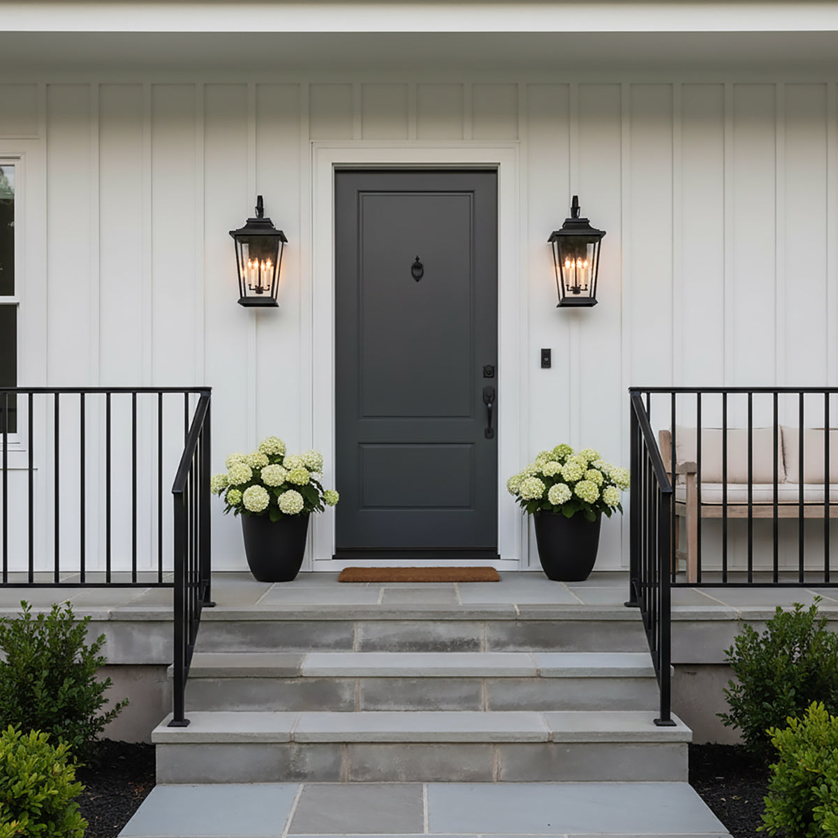 Pembroke Large Outdoor Wall Light 26", Textured Black - Black outdoor wall lights flanking a dark gray door.