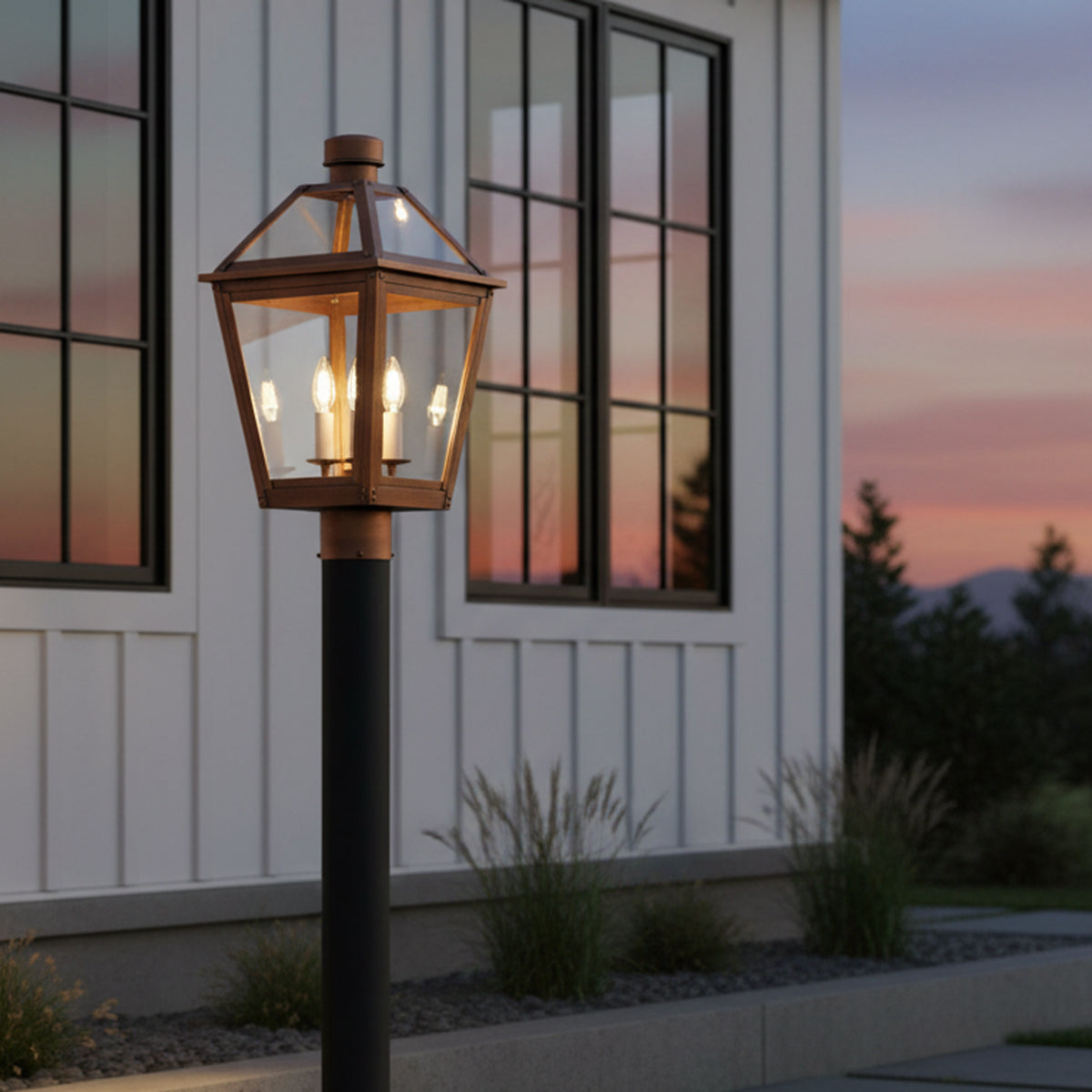 Fairmont Outdoor Post Light, Copper - A copper post light illuminating a yard with a white modern farmhouse style home in the background