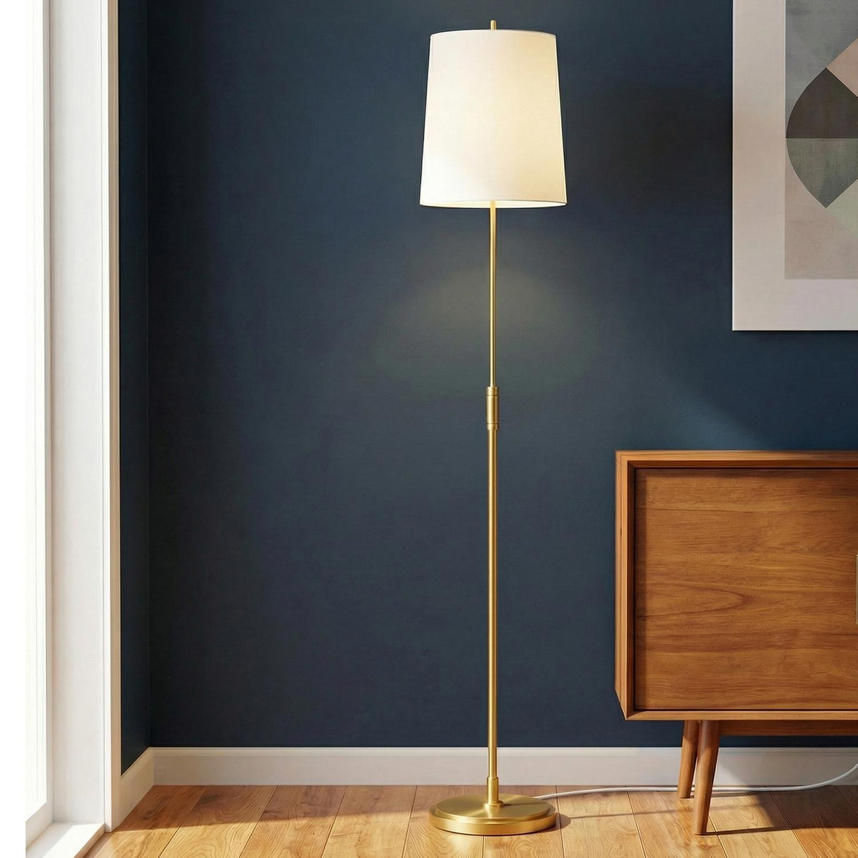 Petra Floor Lamp 65", Modern Brass linear Floor Lamp in a Mid-Century Living Room with a Mid-Century wood cabinet.