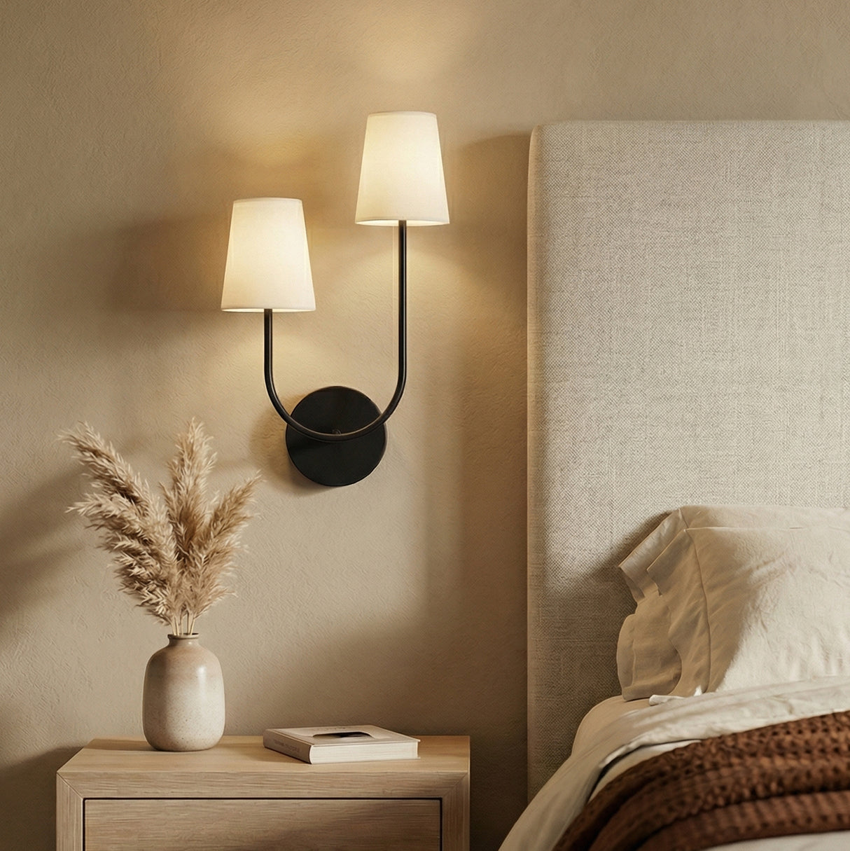 Greta Double Wall Sconce, Black styled in a Contemporary Bedroom with textured walls.