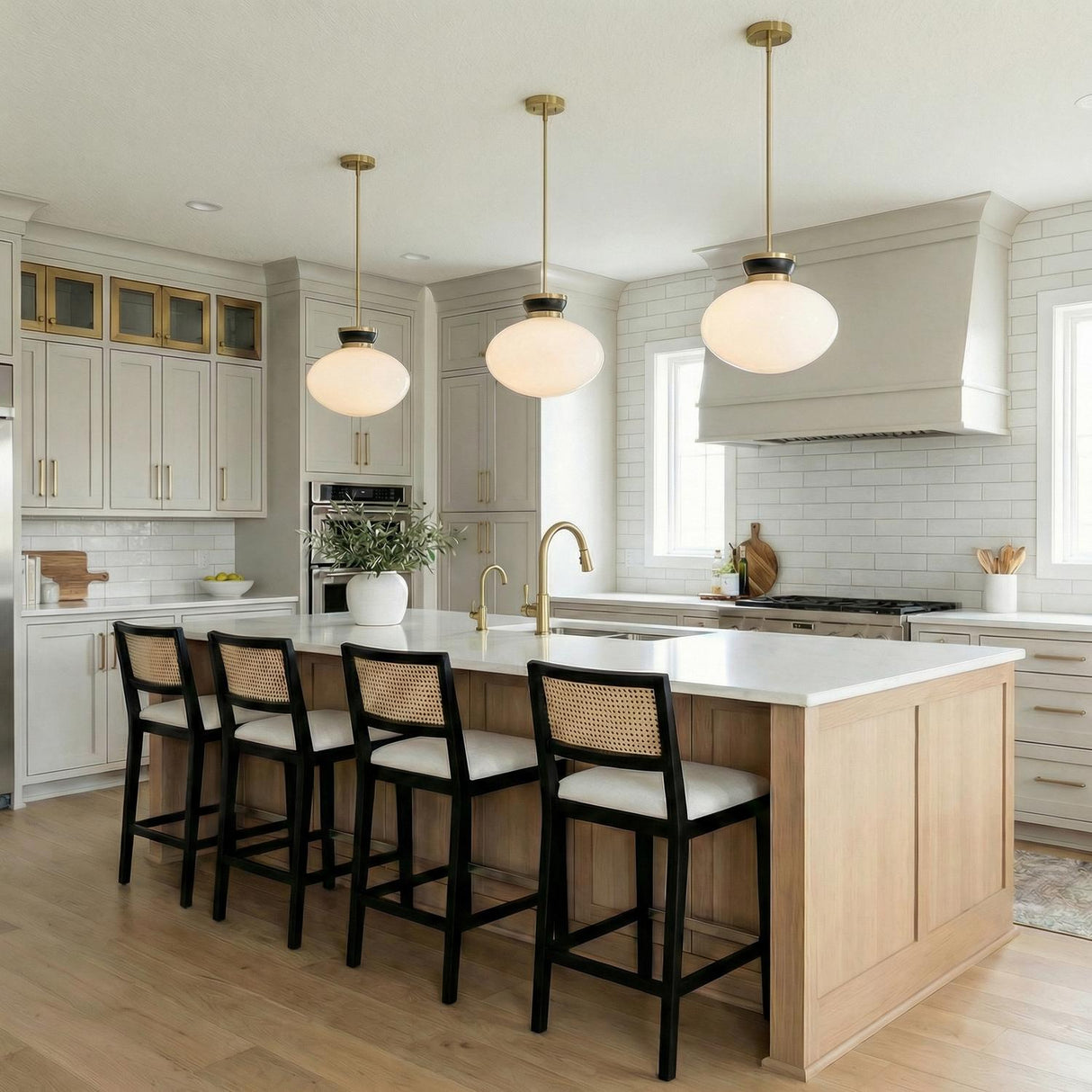 Piper Medium Pendant 15", Satin Brass and Black globe pendant in a Modern Farmhouse Kitchen with a white marble island.