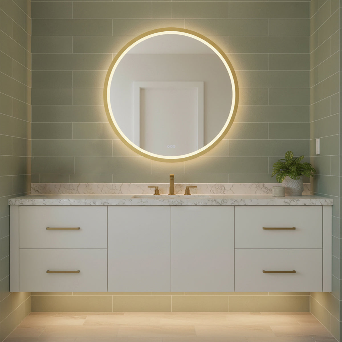 Norma Large LED Round Mirror 42" x 42", Brushed Brass - Round LED mirror illuminating a bathroom with green tile walls and a white vanity.