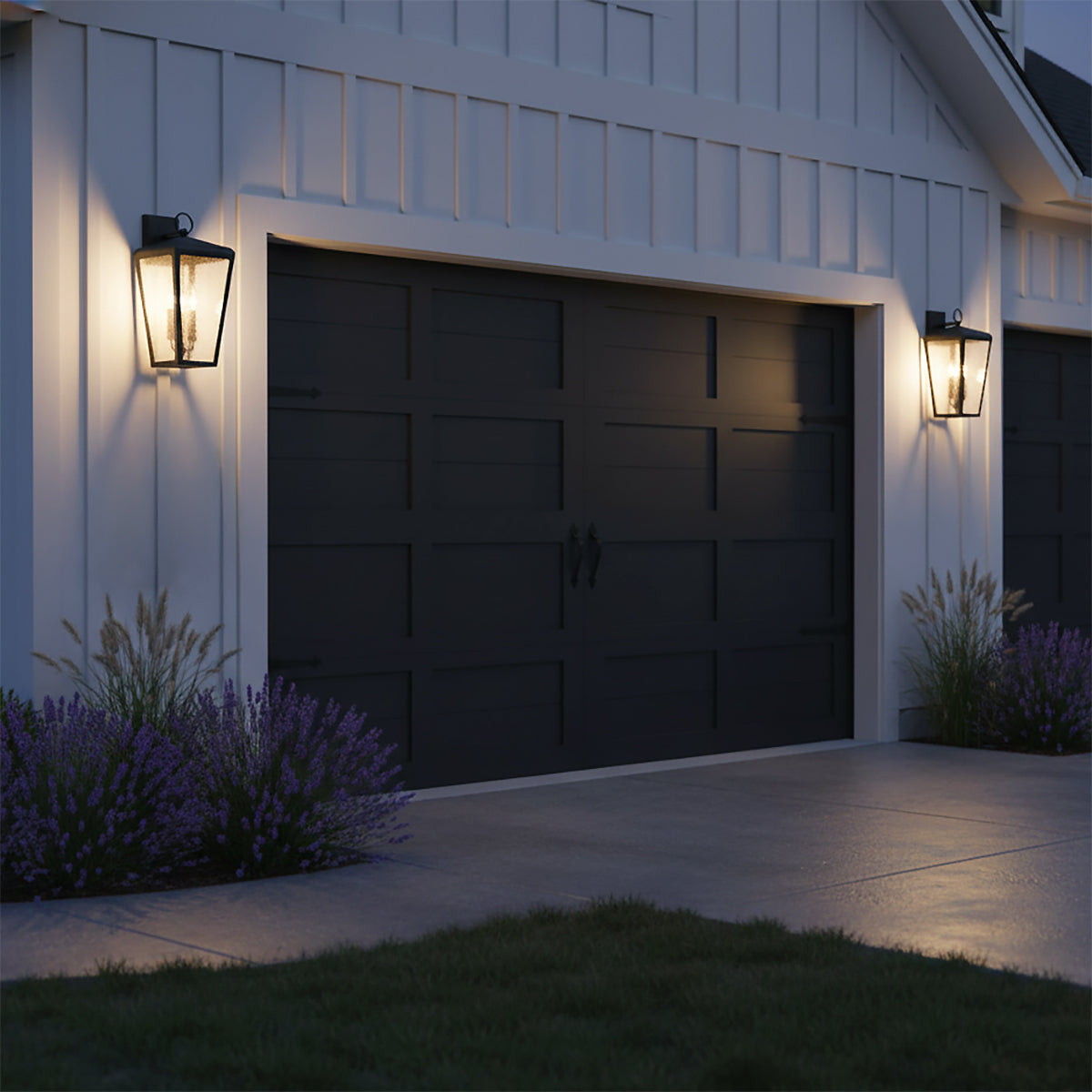 Barrett Outdoor Wall Light, Medium 20" Textured Black - Two black lanterns flanking a black garage door on a white house exterior