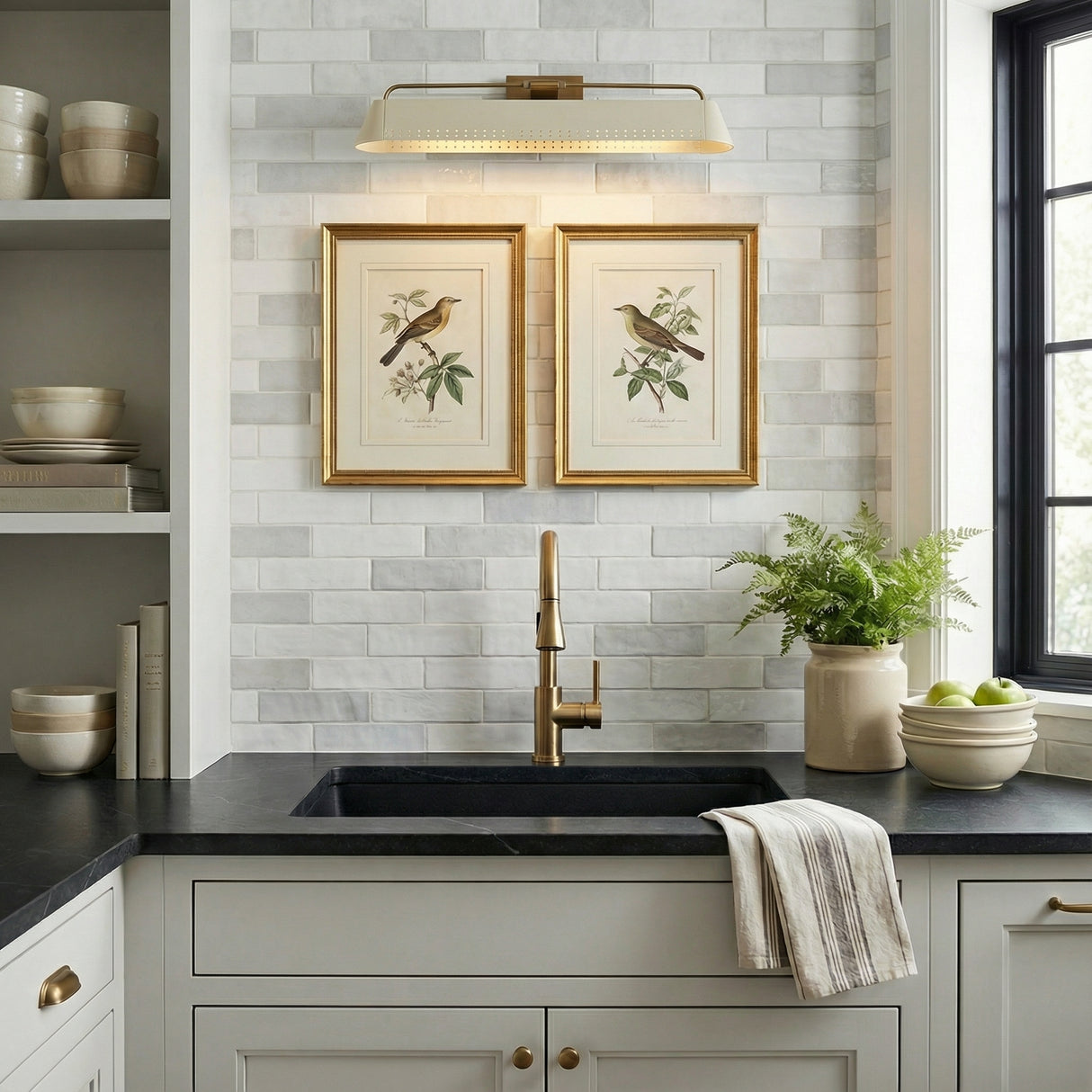 Henley Picture Light 25", Patina Brass and Soft Sand geometric Wall Sconce in a Transitional Kitchen with white subway tile backsplash.