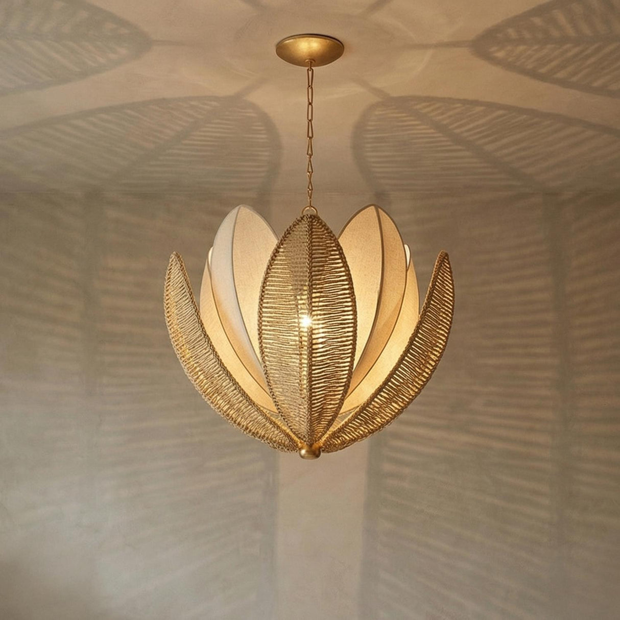 Gold and Natural Woven Lotus leaf design Chandelier in a Transitional Living Room.