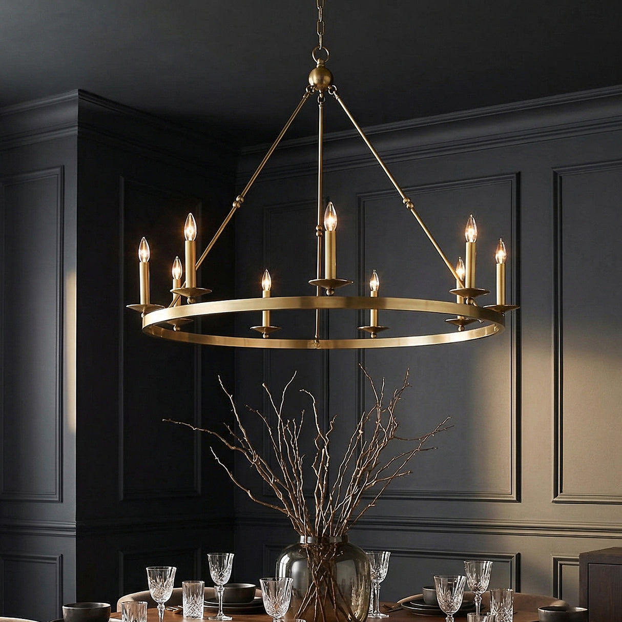 William 9 Light Ring Chandelier 46", Aged Brass geometric Chandelier in a Transitional Dining Room with dark paneled walls.