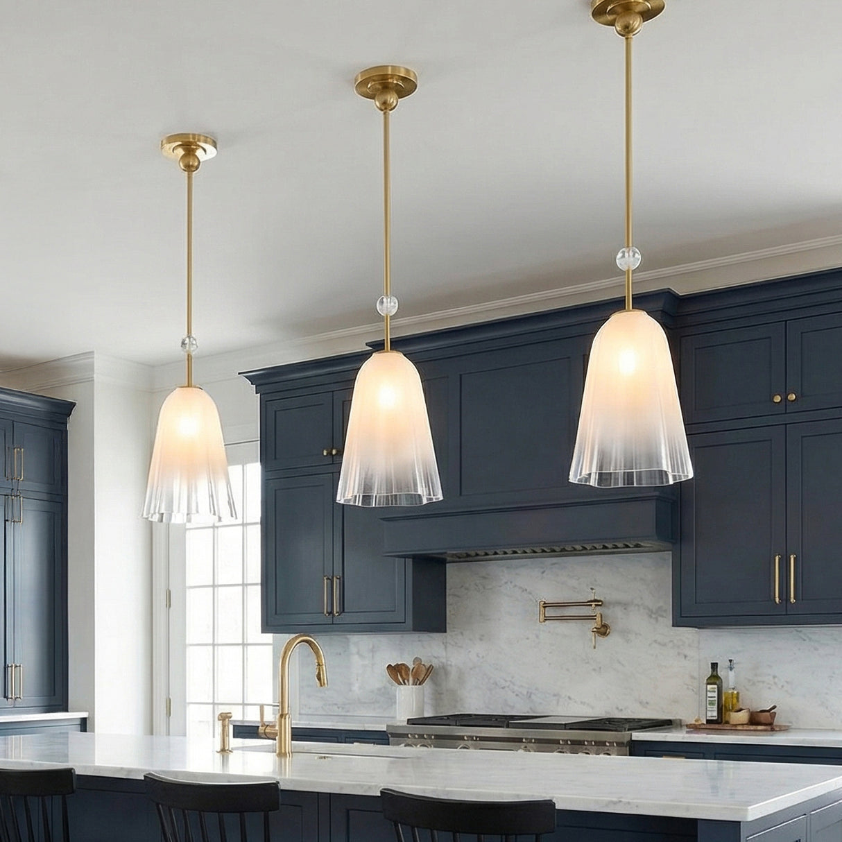 Rosie Pendant 10", Aged Brass scalloped Pendant in a Transitional Kitchen with navy cabinets.