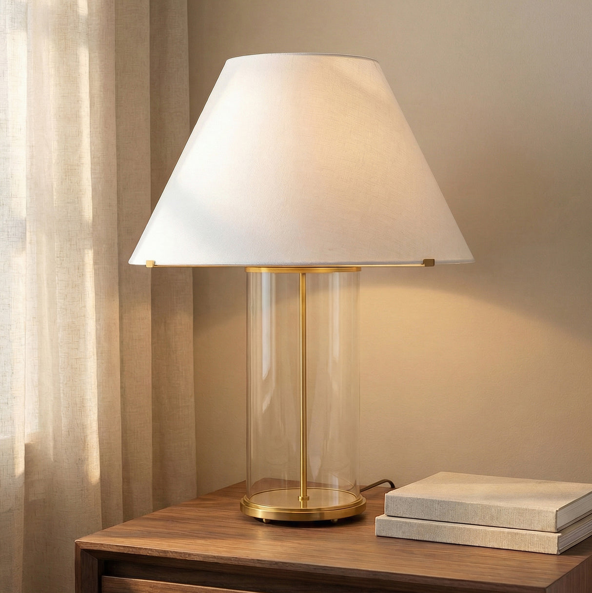 Elena Table Lamp, Aged Brass and Clear Glass linear Table Lamp in a Transitional Living Room with a wooden side table.