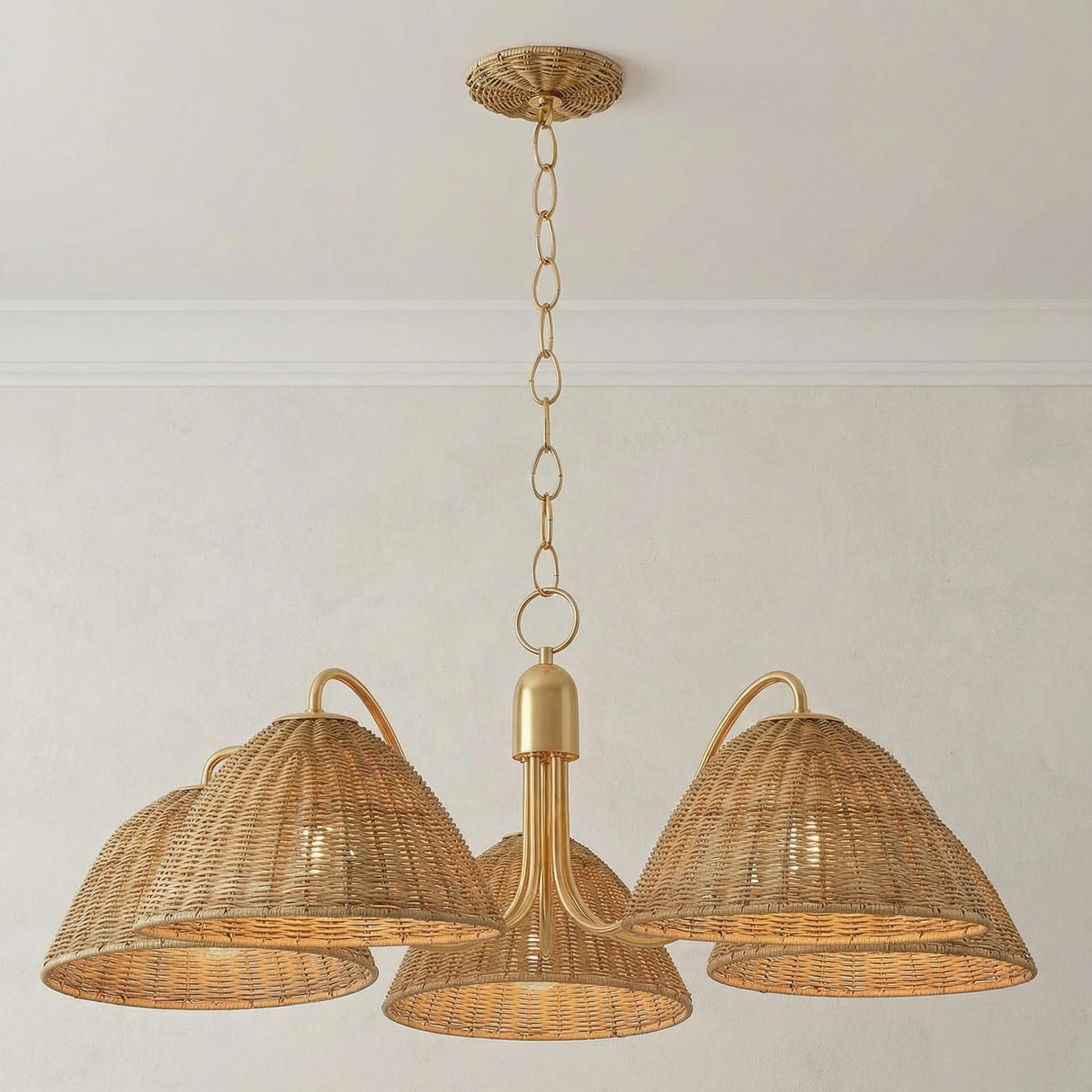 Karina 5 Light Chandelier 38", Aged Brass and Wicker woven Chandelier in a Coastal Living Room with a neutral sofa.