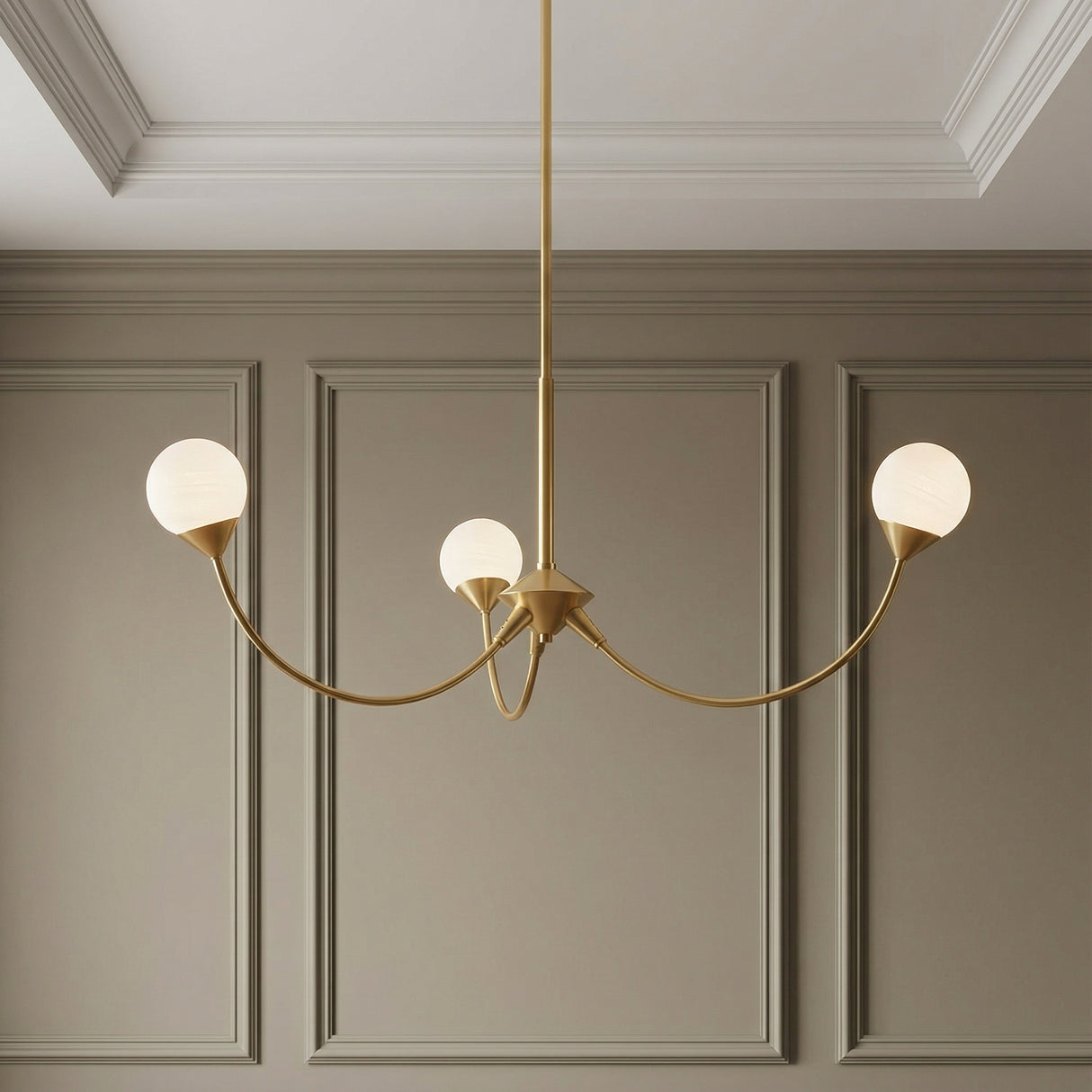 Isabella 3 Light Chandelier 36", Aged Brass globe design Chandelier in a Transitional Dining Room with taupe picture frame molding.