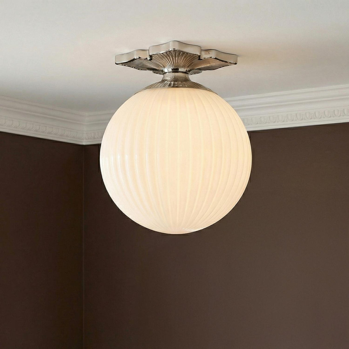 Victoria Semi-Flush 10", Polished Nickel and Opal Ribbed Glass scalloped globe flush mount in a Traditional Hallway with crown molding.