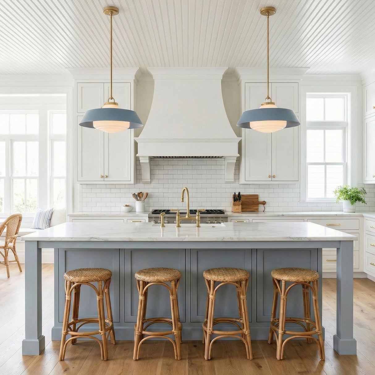 Blaine Large Pendant 20", Brass and French Blue globe pendant in a Coastal Kitchen with a white marble island and rattan stools.