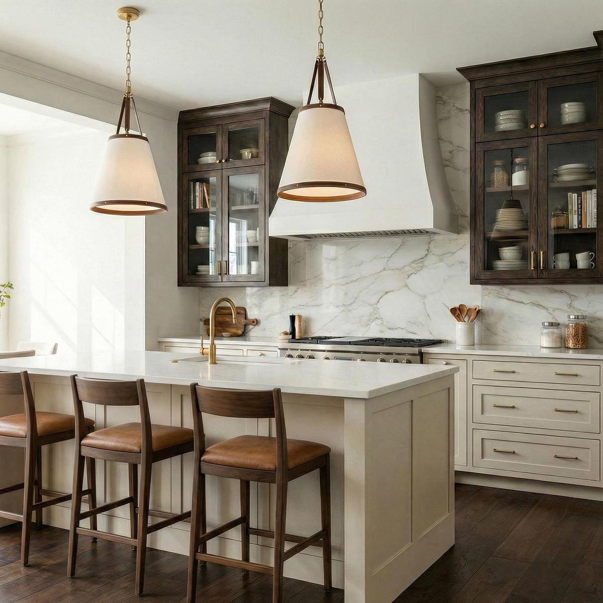 Spencer Medium Pendant 18", Brass with Brown Leather Accents tapered pendant in a Modern Farmhouse Kitchen with a white marble island.