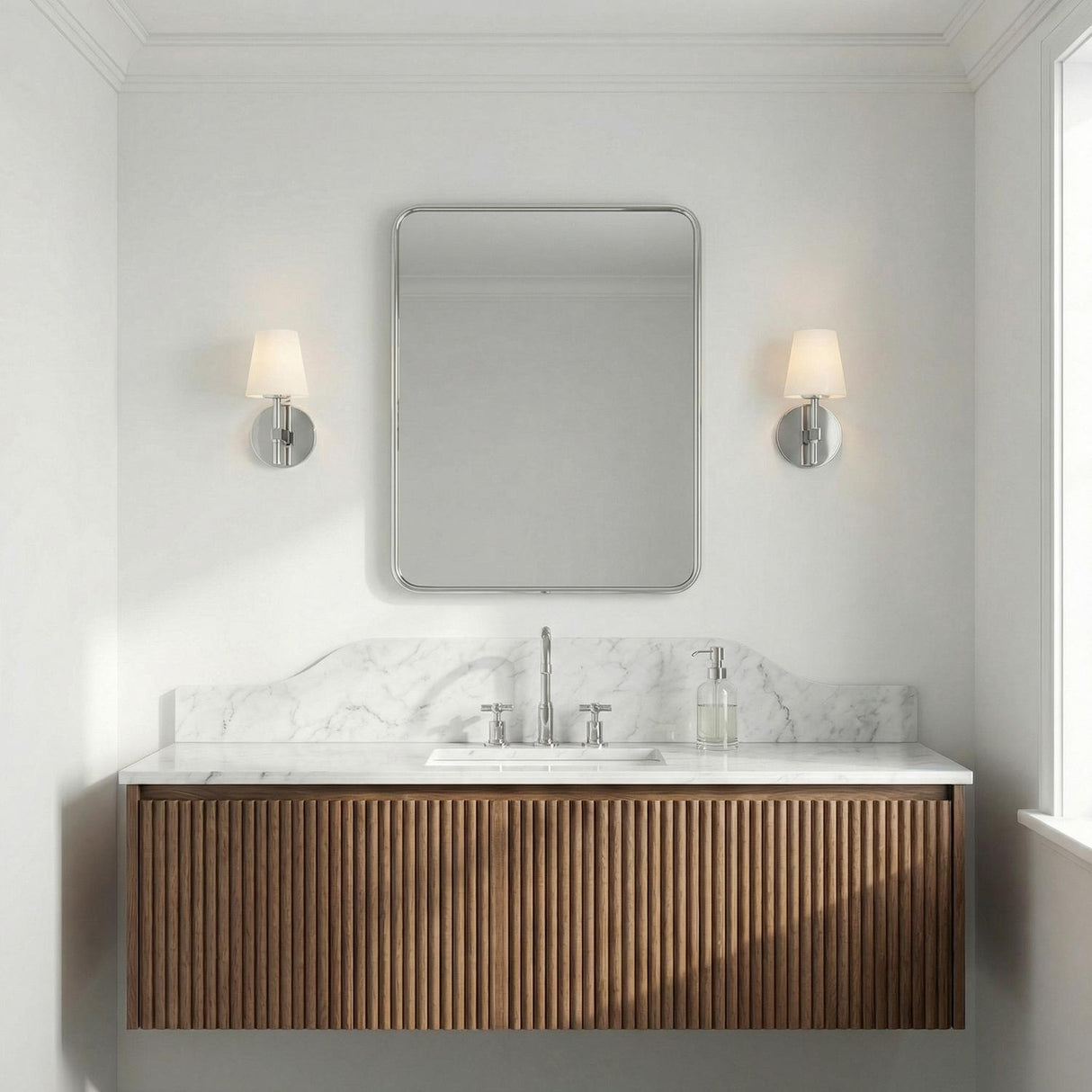 Atticus Wall Sconce 11", Chrome and Opal Glass geometric wall sconce in a Contemporary Bathroom with a fluted wood vanity and marble.