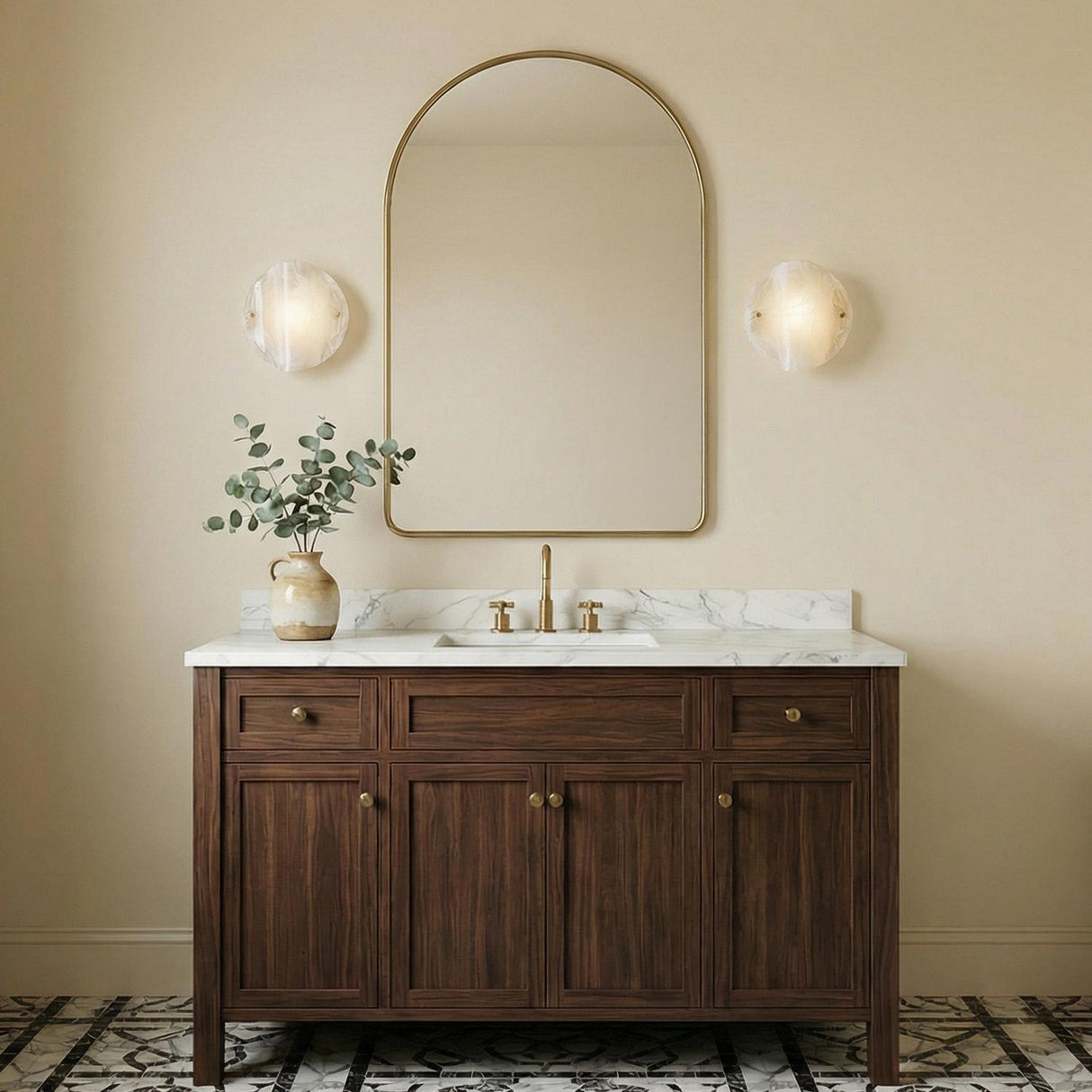 Ovina Wall Sconce 10", Patina Brass and Art Glass scalloped Wall Sconce in a Transitional Bathroom with a dark wood vanity and arched mirror.