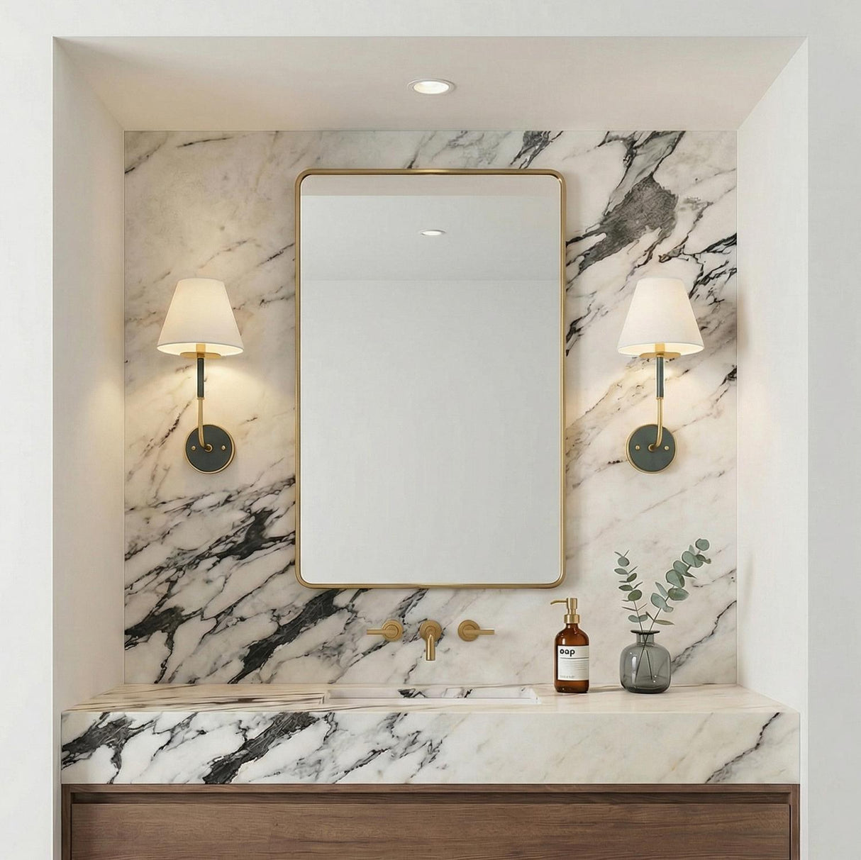 Cicero Wall Sconce 17", Forest Green and Aged Brass geometric Wall Sconce in a Modern Bathroom with a white marble backsplash.