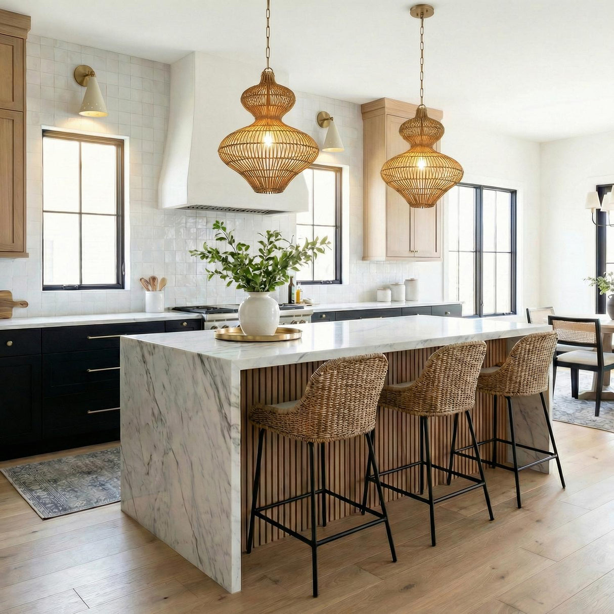 Jaffa Medium Pendant 20", Rattan and Patina Brass woven pendant in a Modern Farmhouse Kitchen with a white marble island.