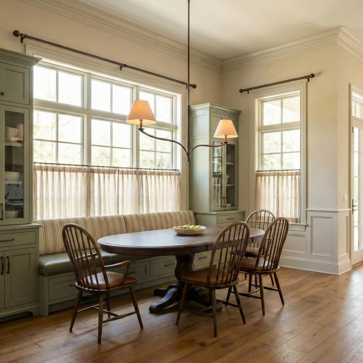 Valen 2 Shade Linear Pendant 56", Forged Bronze linear Pendant in a Transitional Dining Room with a rustic oak table and cabinetry.