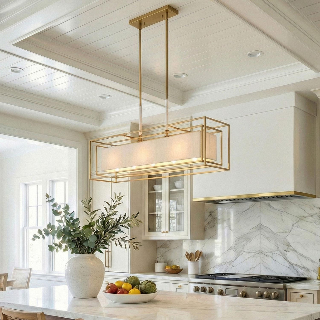 Tilda Linear Pendant 42", Brass geometric pendant in a Modern Farmhouse Kitchen with a white marble island and shiplap ceiling.