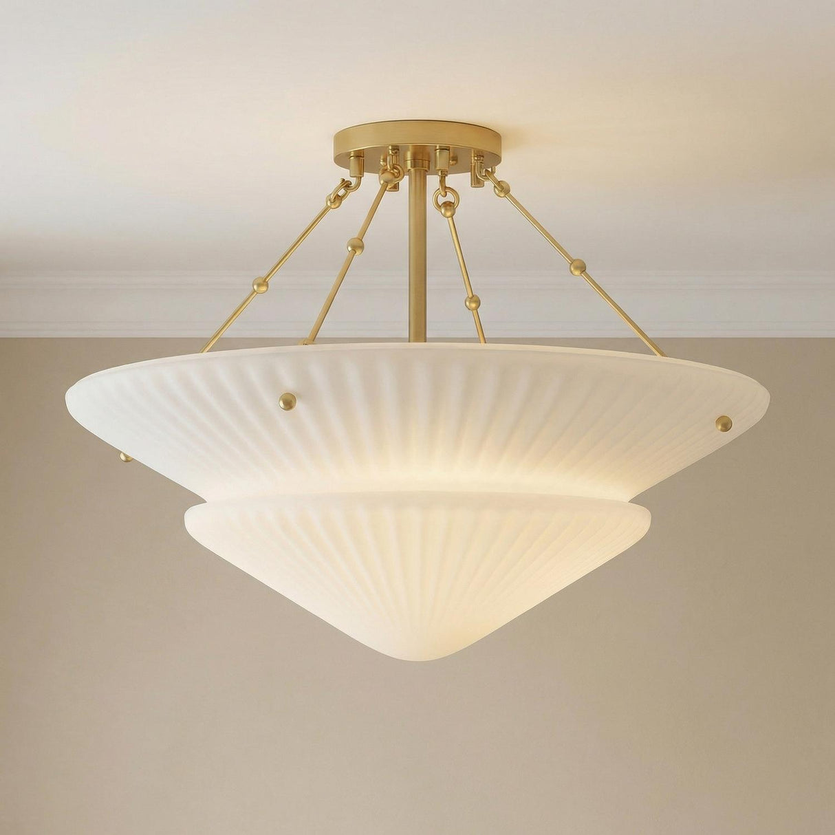 Caspian Semi-Flush 20", Aged Brass and Reeded Opal Glass Aged Brass scalloped Flush Mount in a Transitional Entryway with neutral walls.