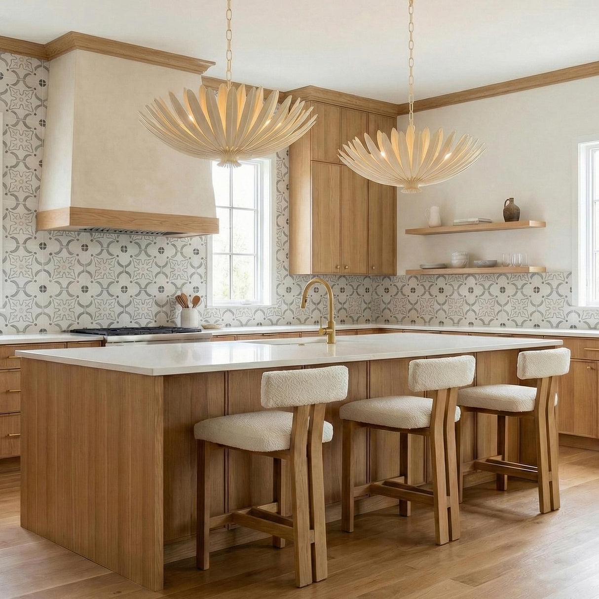 Yasmin Large Pendant 24", Cream leaf design Pendant in a Transitional Kitchen with a white island and bouclé bar stools.