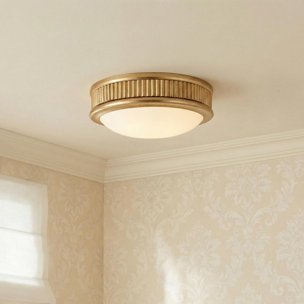 Bishop Small LED Flush Mount 8", Gilded Brass geometric flush mount in a Traditional Bedroom with damask wallpaper.