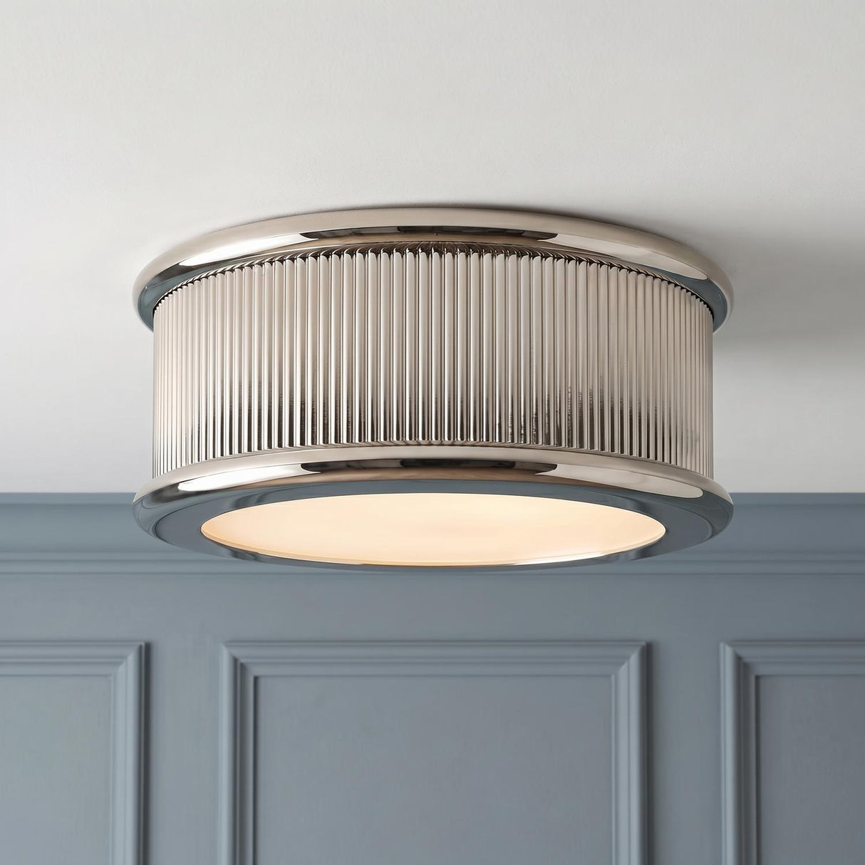Bishop Medium Flush Mount 14", Polished Nickel geometric Flush Mount in a Transitional Hallway with blue wainscoting.