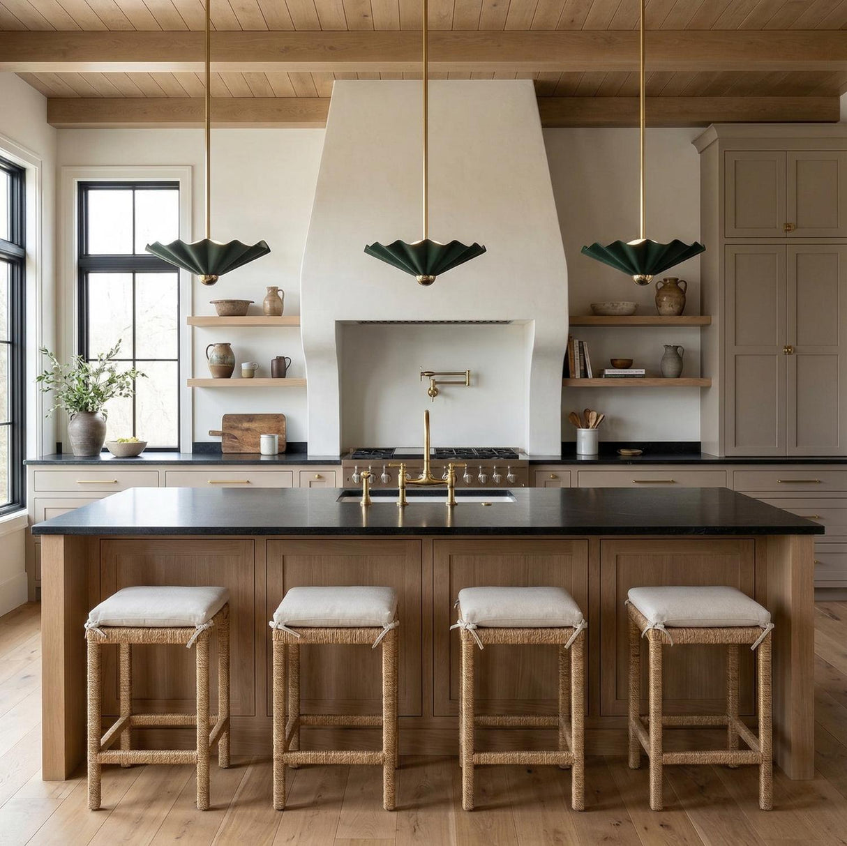 Babette Medium LED Pendant 16", Hunter Green and Brass scalloped Pendant in a Modern Farmhouse Kitchen with a black island and woven stools.