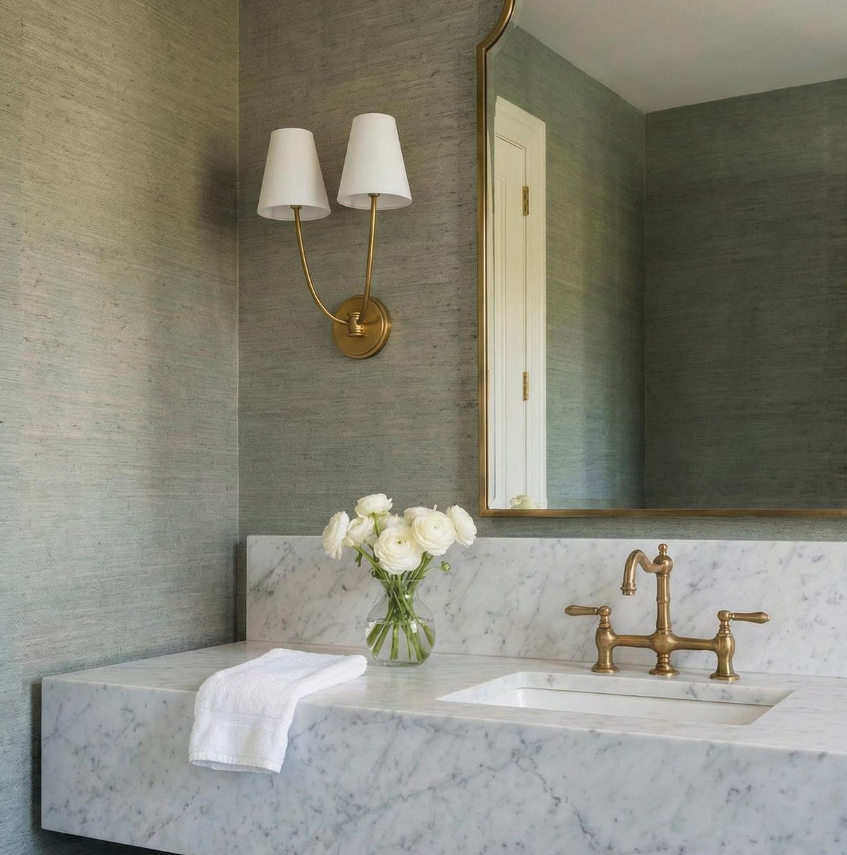 Cordelia Double Wall Sconce 18", Modern Brass geometric Wall Sconce in a Transitional Bathroom with green grasscloth and marble vanity.