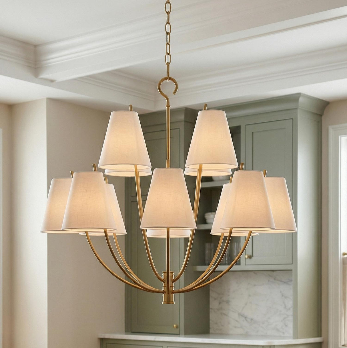 Cordelia 12 Light Chandelier 30", Modern Brass geometric Chandelier in a Transitional Kitchen with sage green cabinetry.