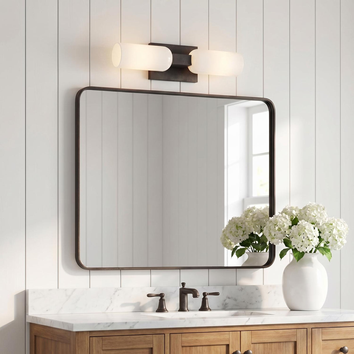 Vesper 2 Light Vanity 21", Aged Iron geometric Vanity in a Modern Farmhouse Bathroom with a marble counter and shiplap walls.
