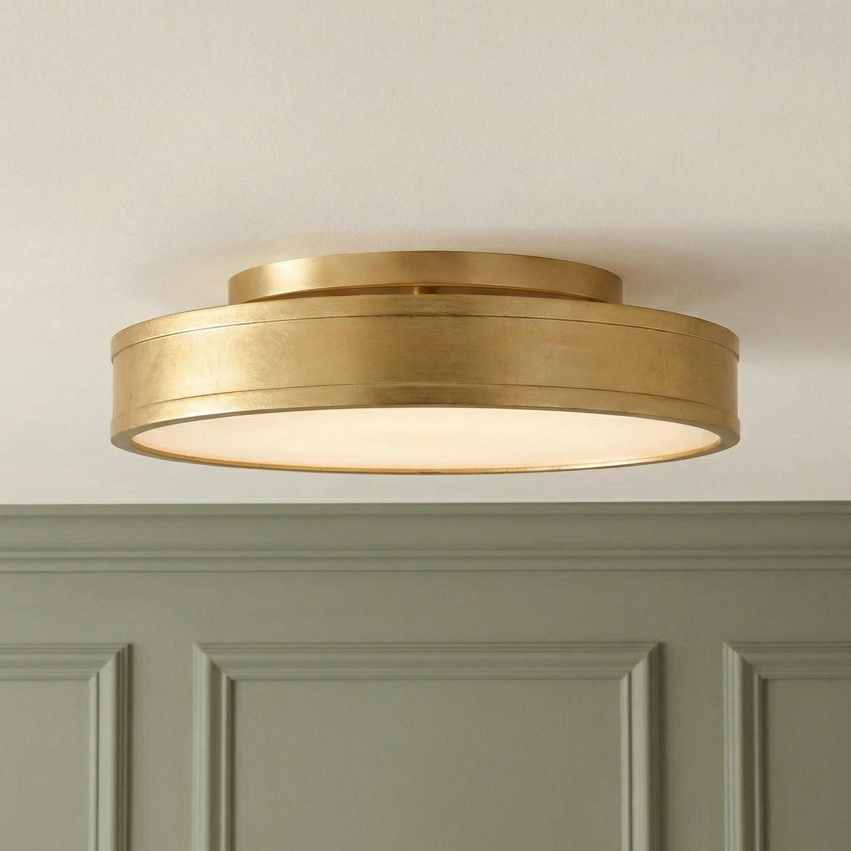 Merton Round LED Semi-Flush 16", Gilded Brass geometric flush mount in a Transitional Hallway with sage green wall paneling.
