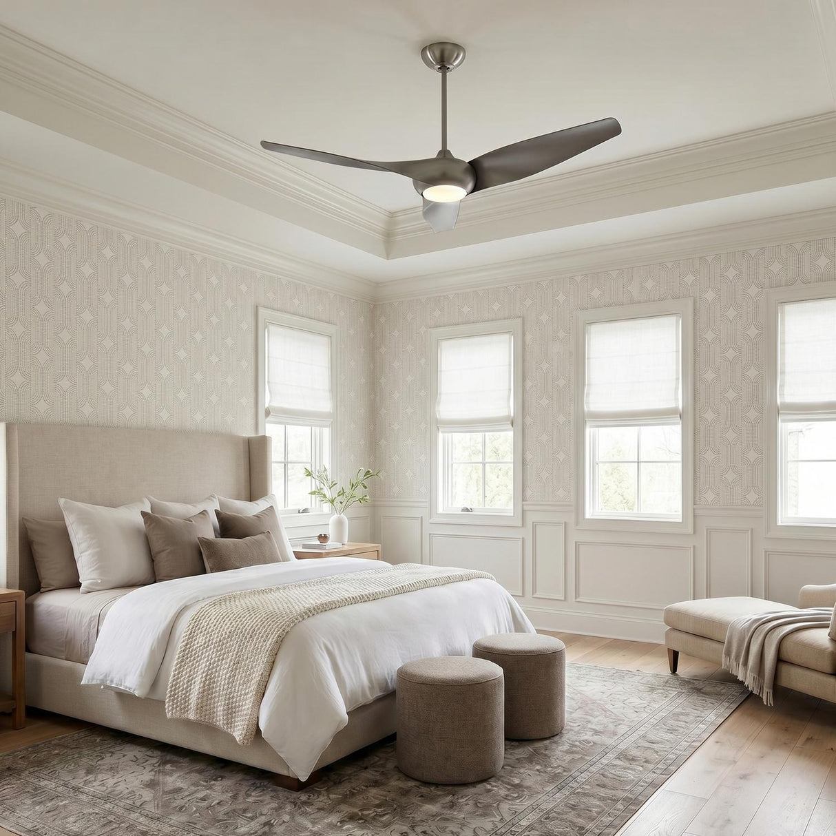A transitional bedroom with the Krestel LED Ceiling Fan 52", Brushed Steel centered on a coffered ceiling above a neutral upholstered bed and patterned wallpaper.