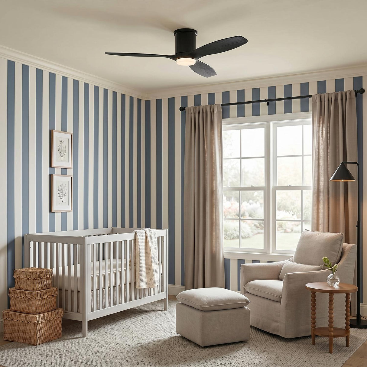 A transitional nursery with blue and white striped wallpaper features the Harrier LED Smart Ceiling Fan 52 in matte black oak mounted above a light gray crib.