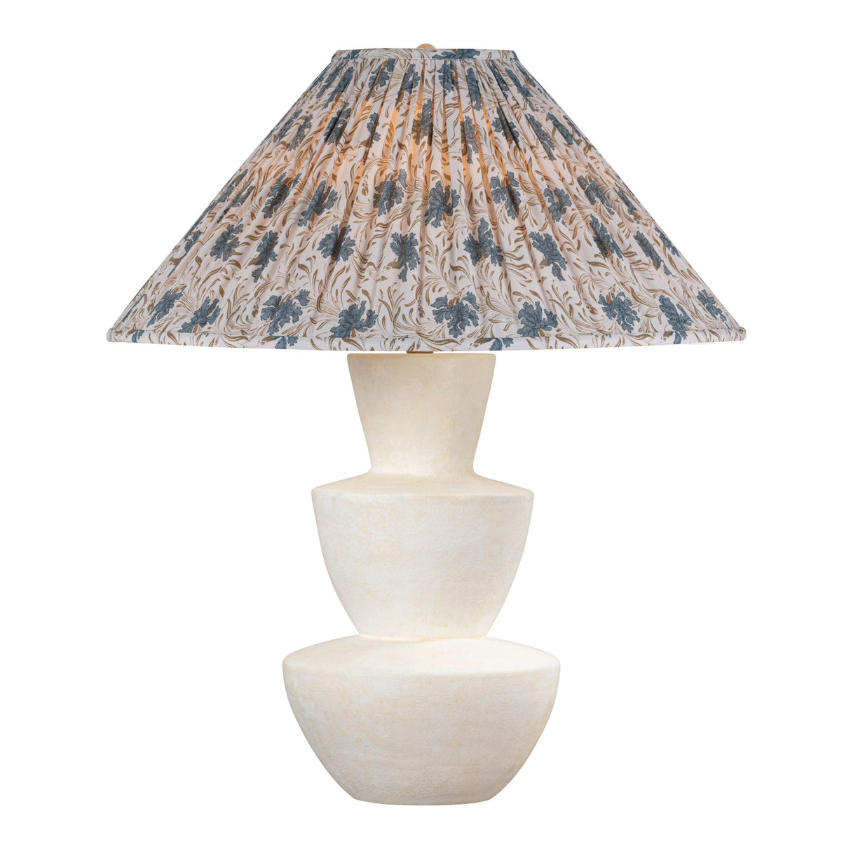 Andrea modern table lamp with a cream-colored stacked ceramic base and a pleated conical shade featuring a slate blue and beige botanical pattern, set against a plain white background.