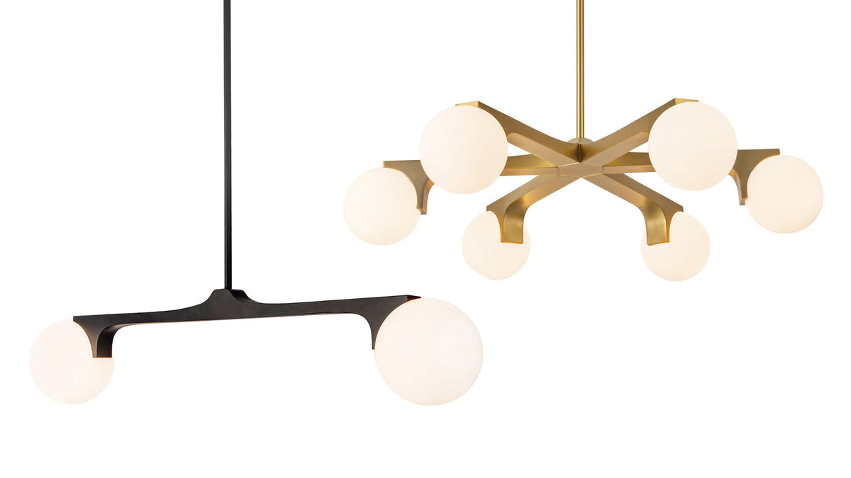 Shop the Duncan Lighting Collection of mid-century modern chandeliers, linear pendants, vanity lights, and wall sconces with opal glass globes and Brushed Brass, Matte Black, or Teak finishes for kitchens, dining rooms, bathrooms, and living spaces.