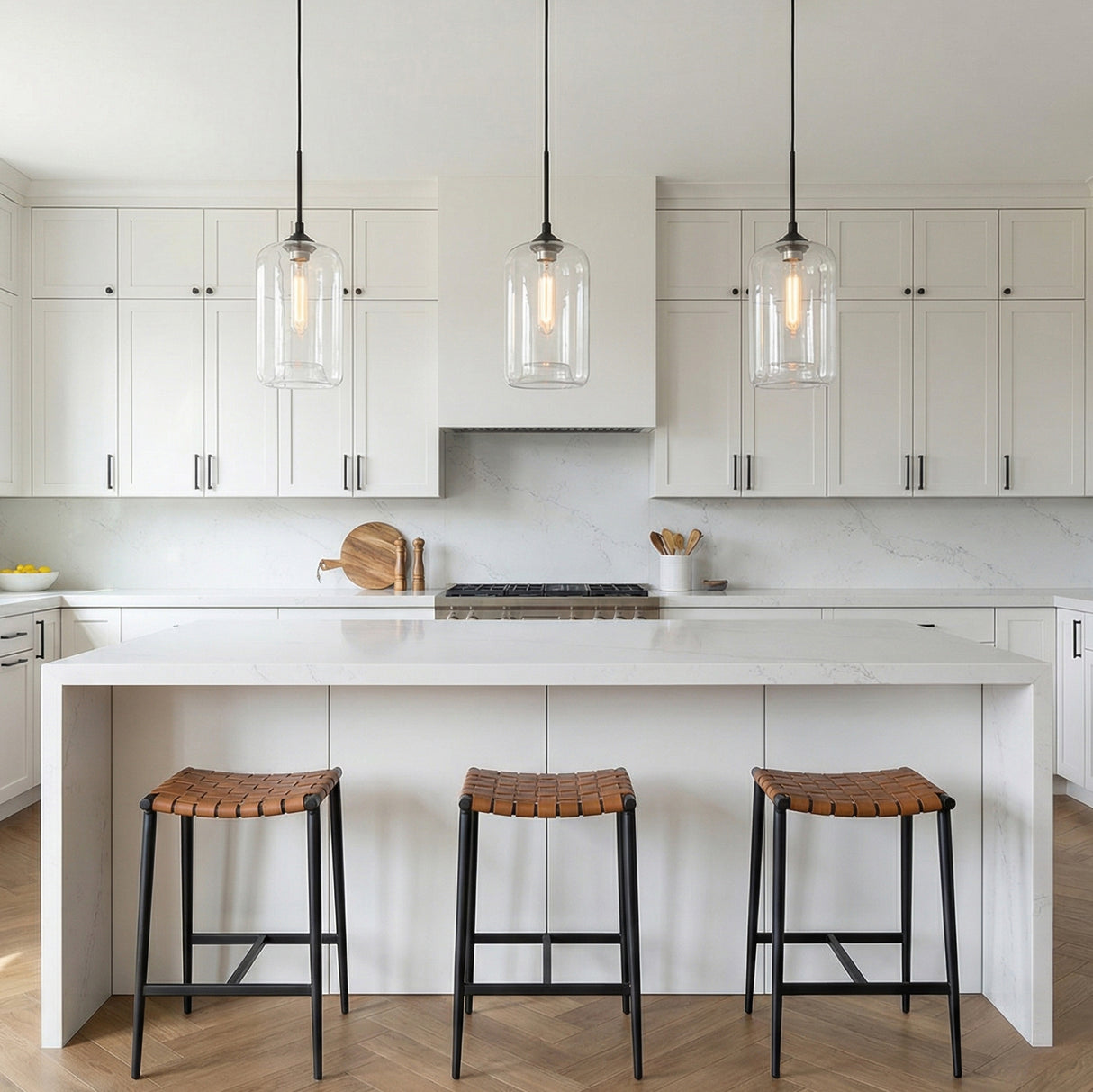 Windsor Heights Cylinder Glass Pendant 7" Black geometric pendant in a Transitional Kitchen with a white marble island.