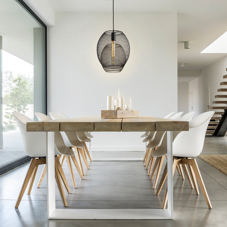 Bergen Oval Pendant Light, hung over dining table in industrial modern loft home