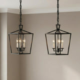 Anover Small Lantern Pendant 9.5", Matte Black geometric Pendant in a Modern Farmhouse Entryway with neutral walls and crown molding.