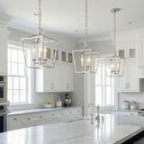 Anover Small Lantern Pendant 9.5", Polished Nickel geometric pendant in a Transitional Kitchen with a white marble island.