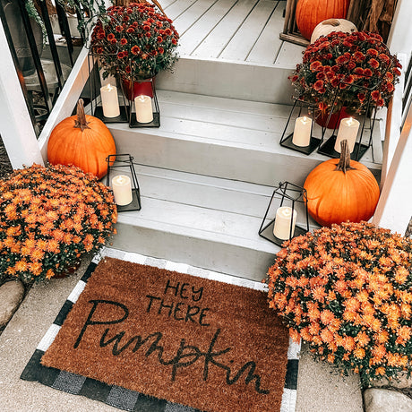 Perry Open Frame Lantern with Flameless Candle, Medium and Large, on a front porch with pumpkins