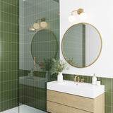 Castell 2 Globe LED Vanity Light, Aged Brass, 16" Double Sconce, in modern green tiled bathroom