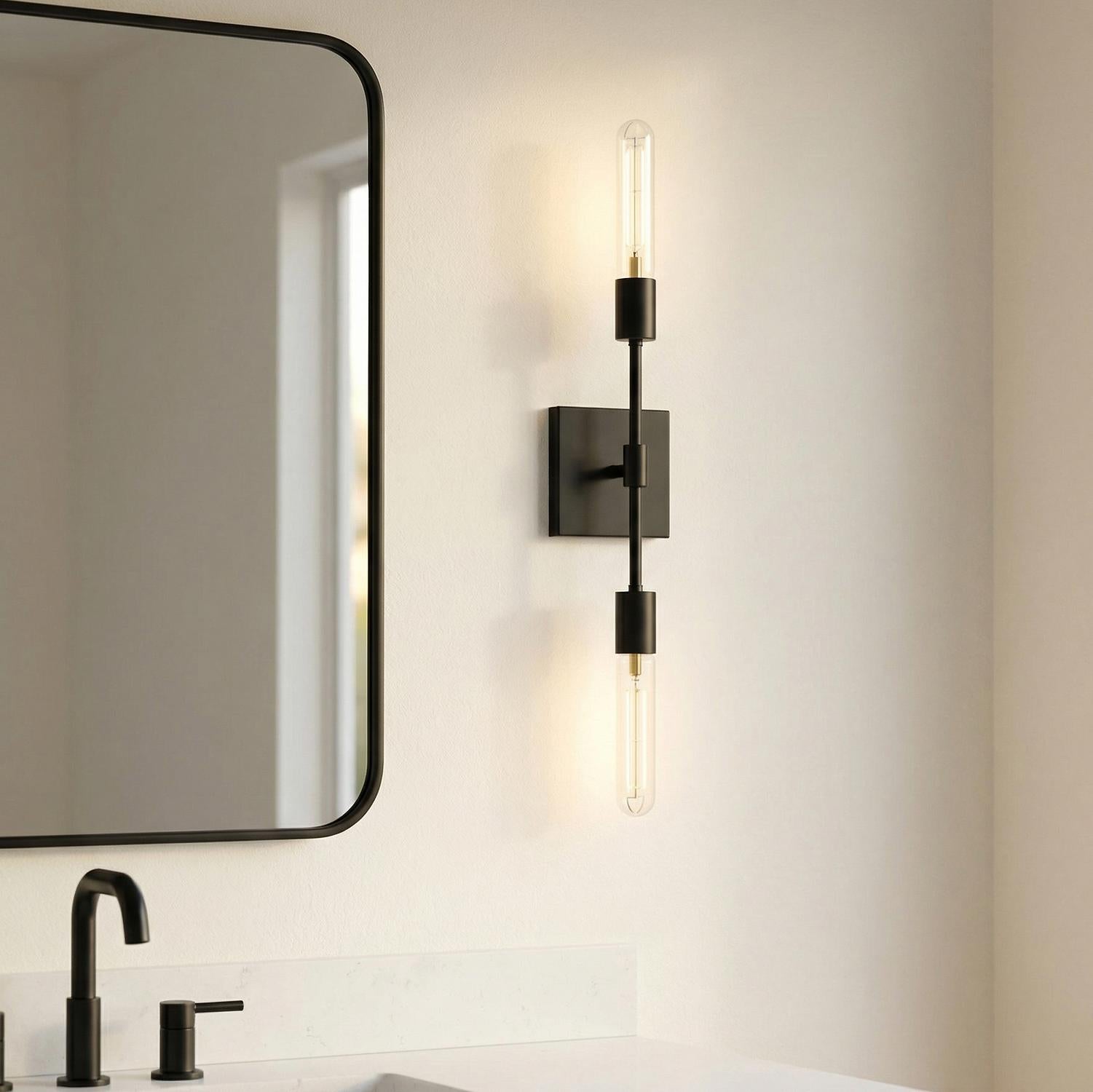 Prospect 2 Light Wall Sconce, Matte Black linear Wall Sconce in a Modern Bathroom with a black mirror and marble vanity.